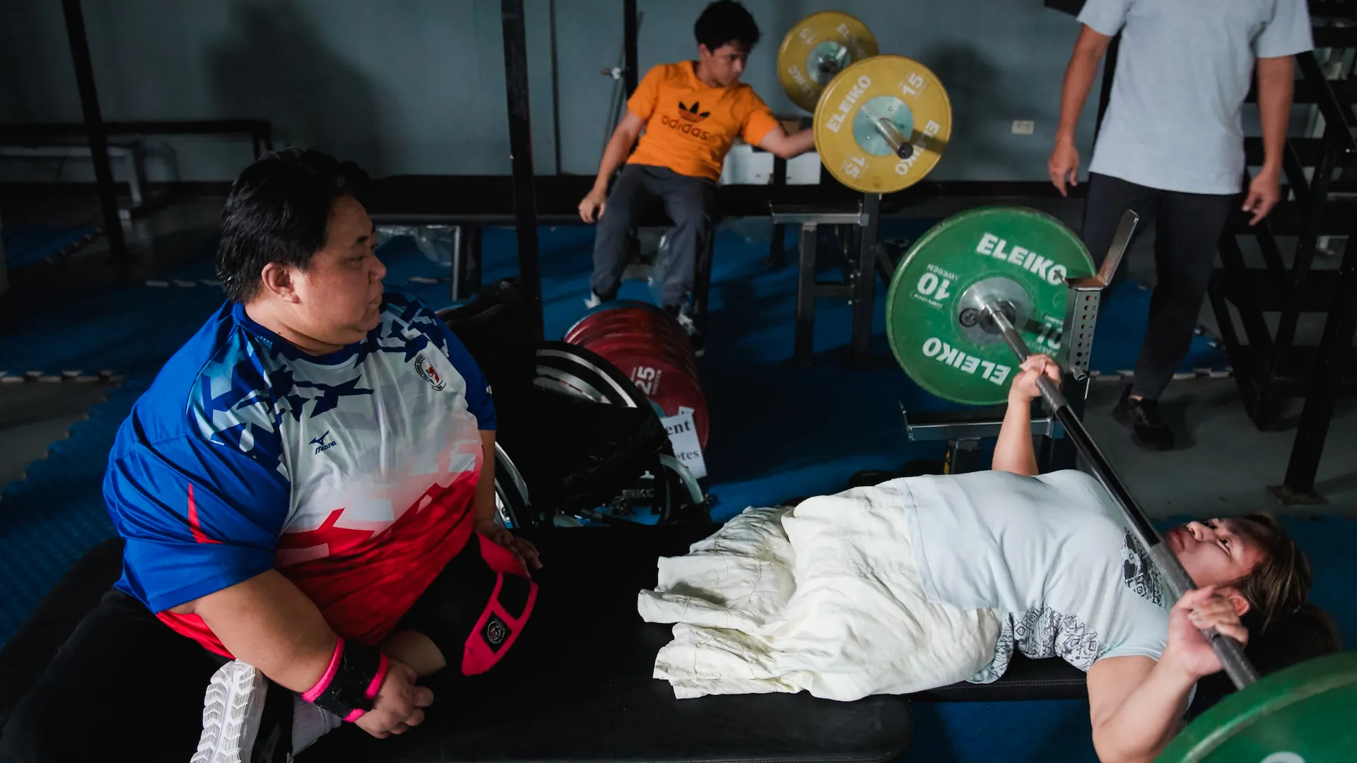 Paralympic weightlifting champ Adeline—and leader at Bahay Mapagmahal—helps train future Paralympic competitors.
